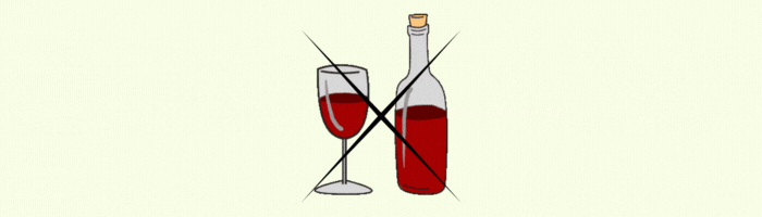 Una botella y una copa de vino tinto tachadas por una cruz